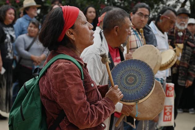April 12, 2026, Tecate, Baja California, Mexico: Members of native communities, mainly Kumeyaay native group, perform a â€oeceremony†rally against the destruction of the Kuchamaa Mountain left by the construction of a new border wall at the US-Mexico Border in Tecate, Baja California, Mexico on Sunday, April 12, 2026. The Kuchamaa Mountain is considered a sacred site by native groups living in both sides of the border. Tecate Mexico - ZUMAm180 20260412_zip_m180_007 Copyright: xCarlosxA.xMorenox