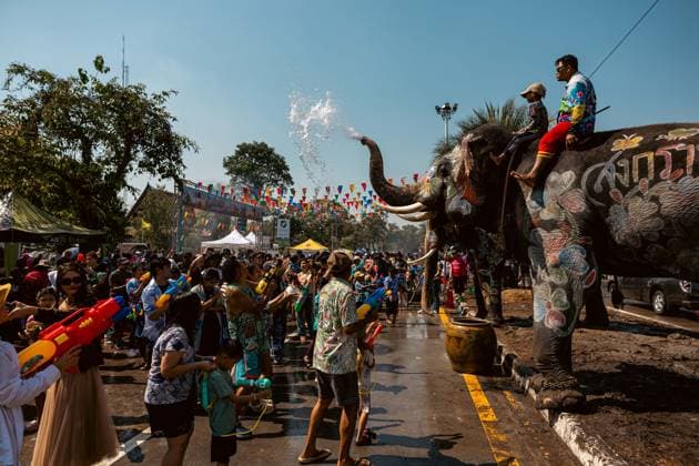 April 13, 2026, Ayuthaya, Thailand: People celebrate Songkran (water festival) with elephants in Ayuthaya, Thailand, Monday, April 13, 2026. Songkran marks the official start of rainy season, though the first rains are often still weeks or months away. Ayuthaya Thailand - ZUMAm249 20260413_zip_m249_005 Copyright: xAndrexMalerbax