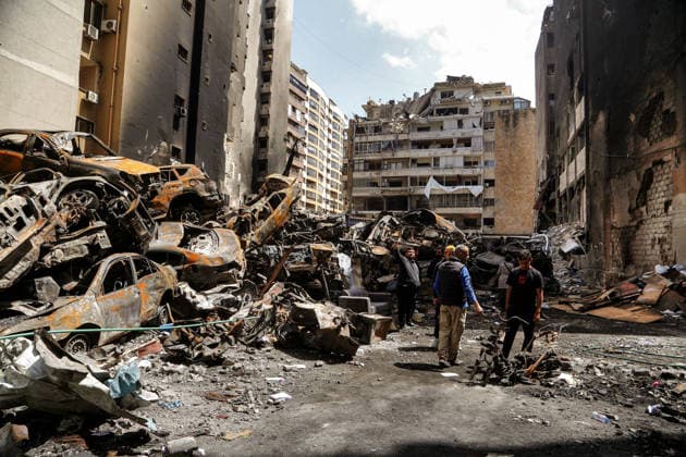April 13, 2026, Beirut, Beirut, Lebanon: People inspect destruction caused by a massive Israeli air strike in Beirut, 08 April. Lebanon marks the 51st anniversary of civil war as the country has been dragged back into a state of turmoil and violence following the start between Israel and pro-Iranian Hezbollah Lebanese ministry said 2,055 were killed and 6,588 people were wounded since Lebanon was drawn into the Middle East war on March 2. Beirut Lebanon  - ZUMAn313 20260413_zip_n313_004 Copyright: xMarwanxNaamanix