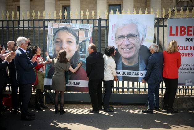 REMOVAL OF PORTRAITS OF CECILE KOHLER AND JACQUES PARIS ASSEMBLEE NATIONALE Thomas Padilla MAXPPP Paris FRANCE 14 04 2026 CEREMONY FOR THE REMOVAL OF THE TWO FORMER HOSTAGES IN IRAN, CECILE KOHLER AND JACQUES PARIS ON THE GATES OF THE NATIONAL ASSEMBLY IN PRESENCE OF THE PRESIDENT OF THE NATIONAL ASSEMBLY, YAEL BRAUN PIVET Ceremony for the removal of the two former hostages in Iran, Cecile Kohler and Jacques Paris on the gates of the National Assembly in Paris on April 14, 2026 Paris FRANCE  Copyright: xMAXPPPxThomasxPadillax TPA260414003 TPA260414003