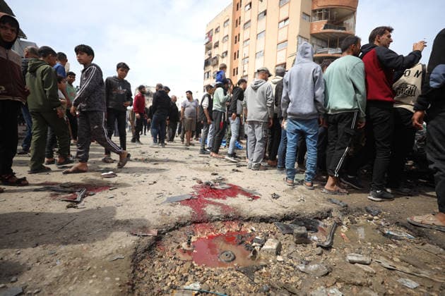 Israeli airstrike on police vehicle kills 4 in Gaza GAZA CITY, GAZA, PALESTINE - APRIL 14: Palestinians inspect the damaged car after an Israeli airstrike targeting a police vehicle killed four Palestinians and injured many others in Gaza City, Gaza, Palestine on April 14, 2026. Khames Alrefi Anadolu Gaza City Gaza. Editorial use only. Please get in touch for any other usage.  Copyright: x2026xAnadoluxKhamesxAlrefix