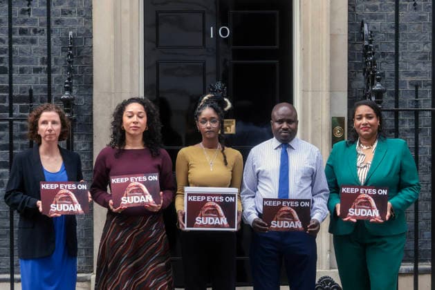 . 14 04 2026. London, United Kingdom. Sudanese Petition Downing Street. CAFOD (Catholic Agency for Overseas Development) and other leading charities join Anneliese Dodds MP and Sudanese representatives in Downing Street to deliver a 41,243-strong petition demanding action from the UK Government.  xMartynxWheatleyx xi-Imagesx IIM-26700-0005