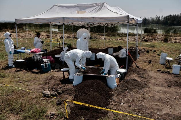 April 14, 2026, Mexico City, Cdmx, Mexico: Between the borders of the Tlahuac region of Mexico City and Chalco, State of Mexico, lie the lagoons that divide these areas. Within a particular zone known as Lagunas de La Habana (Havana Lagoons), more than 500 human skeletal remains (teeth and bones from different parts of the body) have been found to date, buried in the mud at a very shallow depth. This is because it is a chinampa (floating garden) area, making it impossible that this area was used as a cemetery. The remains are found at a very shallow depth; after only 20 centimeters, the water reaches the lagoon. The search continues, carried out by personnel from the Attorney General s Offices, police, the National Guard, and the State - ZUMAp204 20260414_zip_p204_021 Copyright: xJosuexPerezx