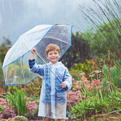 Cropped portrait of a young boy standing outside in the rain. (License=RF) ,model released, Symbolfoto  Copyright: xZoonar.com YurixArcursx 18390118 ,model released, Symbolfoto ,property released
