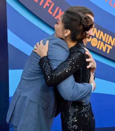 Cast members Scott MacArthur (L) and Brenda Song attend the premiere of Netflix s Season 2 TV series sport comedy Running Point at the Egyptian Theatre in the Hollywood section of Los Angeles on Wednesday, April 15, 2026..Storyline: Isla Gordon, overlooked her whole life, is appointed President of the LA Waves basketball team, a family business, when her brother enters rehab. She aims to prove she is the right choice despite skepticism.  LAP2026041533 JIMxRUYMEN