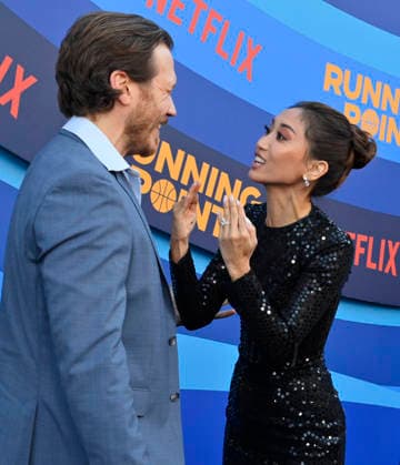 Cast members Scott MacArthur (L) and Brenda Song attend the premiere of Netflix s Season 2 TV series sport comedy Running Point at the Egyptian Theatre in the Hollywood section of Los Angeles on Wednesday, April 15, 2026..Storyline: Isla Gordon, overlooked her whole life, is appointed President of the LA Waves basketball team, a family business, when her brother enters rehab. She aims to prove she is the right choice despite skepticism.  LAP2026041534 JIMxRUYMEN