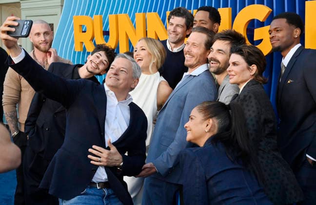 Ted Sarandos takes a selfie off cast members during the premiere of Netflix s Season 2 TV series sport comedy Running Point at the Egyptian Theatre in the Hollywood section of Los Angeles on Wednesday, April 15, 2026. Storyline: Isla Gordon, overlooked her whole life, is appointed President of the LA Waves basketball team, a family business, when her brother enters rehab. She aims to prove she is the right choice despite skepticism.  LAP2026041512 JIMxRUYMEN