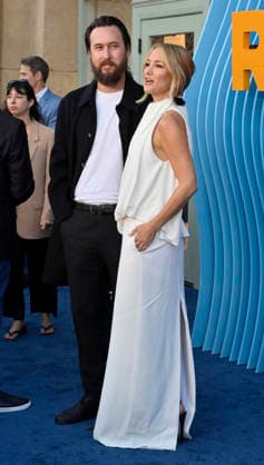 Cast member Kate Hudson and musician Danny Fujikawa attend the premiere of Netflix s Season 2 TV series sport comedy Running Point at the Egyptian Theatre in the Hollywood section of Los Angeles on Wednesday, April 15, 2026. Storyline: Isla Gordon, overlooked her whole life, is appointed President of the LA Waves basketball team, a family business, when her brother enters rehab. She aims to prove she is the right choice despite skepticism.  LAP2026041502 JIMxRUYMEN