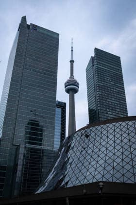 CANADA ONTARIO TORONTO CN TOWER SKYLINE DOWNTOWN The CN Tower rises between glass office towers above a curved roof structure in downtown Toronto, Ontario, Canada, April 28, 2023 Downtown Toronto is the city main business district and skyline core, where corporate towers, major public venues and dense high rise development define the urban landscape The CN Tower rises between glass office towers above a curved roof structure in downtown Toronto, Ontario, Canada, April 28, 2023 Downtown Toronto is the city main business district and skyline core, where corporate towers, major public venues and dense high rise development define the urban landscape TORONTO DOWNTOWN CANADA 