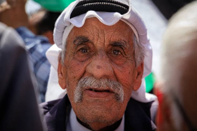 Prisoners Day March Gaza April 16 A Palestinian looks on during a march in Gaza City on April 16, 2026, ahead of Prisoners™ Day on April 17, calling for the release of detainees and rejecting Israel™s new death penalty law for certain Palestinian prisoners. The march headed toward the International Committee of the Red Cross headquarters, with participants carrying Palestinian flags and solidarity banners. Gaza Gaza Strip Palestine Territories Copyright: xMohammedxMxSkaikx