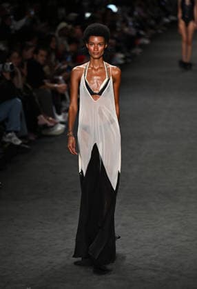 (260417) -- RIO DE JANEIRO, April 17, 2026 -- A model presents a creation by Blue Man during the Rio Fashion Week in Rio de Janeiro, Brazil, April 16, 2026. The Rio Fashion Week 2026 is held in Rio de Janeiro from Tuesday to Saturday, with around 20 fashion brands presenting their latest creations. ) BRAZIL-RIO DE JANEIRO-FASHION WEEK JinxHaoyuan 