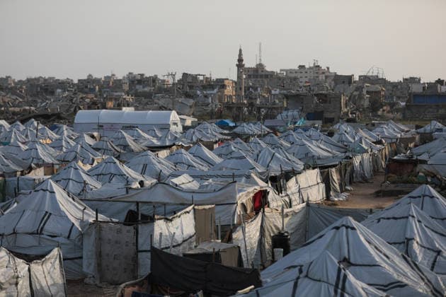 Displaced families struggle in Nuseirat Camp NUSEIRAT, GAZA, PALESTINE - APRIL 18 Hundreds of Palestinian families displaced by Israeli attacks in the Gaza Strip continue to live in tents under difficult conditions in the Nuseirat camp in Gaza, Palestine on April 18, 2026. Families who lost their homes are trying to sustain their daily lives with limited resources in makeshift shelters. Adam Bilal Anadolu Nuseirat Gaza. Editorial use only. Please get in touch for any other usage.  Copyright: x2026xAnadoluxAdamxBilalx
