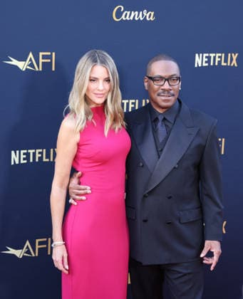 April 18, 2026, Hollywood, California, USA: American Actor and Comedian EDDIE MURPHY, 65, and his Australian Actress wife PAIGE BUTCHER, 46, in a Barbie-pink dress, is on the Red Carpet before Murphy receives the American Film Instituteâ€⠢s (AFI) Life Time Achievement Award on April 18, 2026 in Hollywood, California at the Dolby Theater, Los Angeles. The event is sponsored by Netflix. Hollywood USA - ZUMAk144 20260418_znp_k144_009 Copyright: xAmyxKatzx