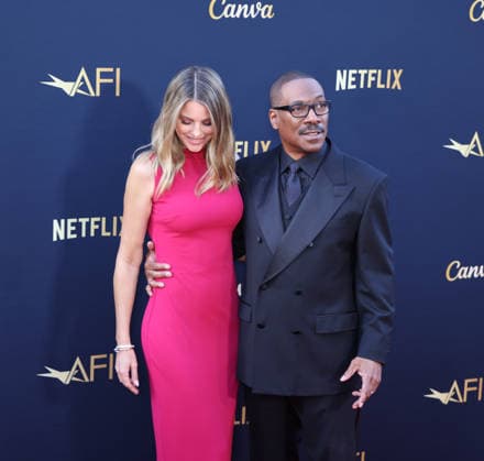 April 18, 2026, Hollywood, California, USA: American Actor and Comedian EDDIE MURPHY, 65, and his Australian Actress wife PAIGE BUTCHER, 46, in a Barbie-pink dress, is on the Red Carpet before Murphy receives the American Film Instituteâ€⠢s (AFI) Life Time Achievement Award on April 18, 2026 in Hollywood, California at the Dolby Theater, Los Angeles. The event is sponsored by Netflix. Hollywood USA - ZUMAk144 20260418_znp_k144_014 Copyright: xAmyxKatzx