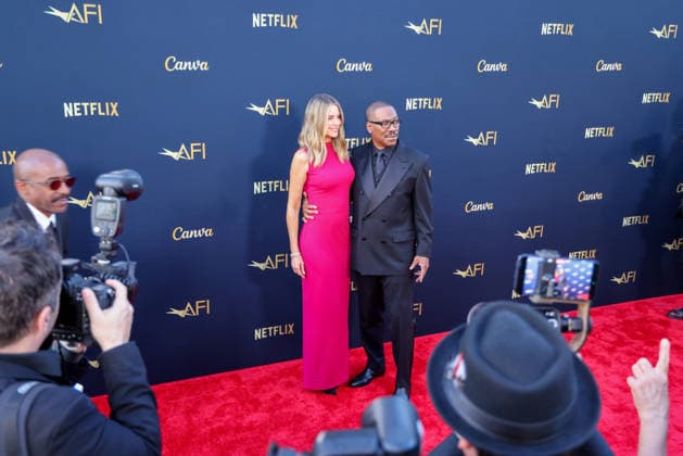 April 18, 2026, Hollywood, California, USA: American Actor and Comedian EDDIE MURPHY, 65, and his Australian Actress wife PAIGE BUTCHER, 46, in a Barbie-pink dress, is on the Red Carpet before Murphy receives the American Film Instituteâ€⠢s (AFI) Life Time Achievement Award on April 18, 2026 in Hollywood, California at the Dolby Theater, Los Angeles. The event is sponsored by Netflix. Hollywood USA - ZUMAk144 20260418_znp_k144_018 Copyright: xAmyxKatzx