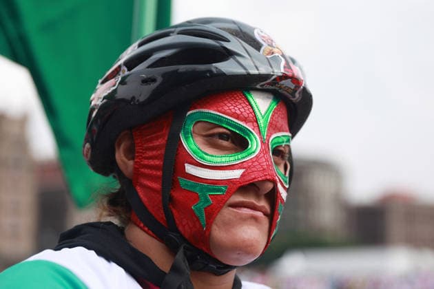 Thousands of cyclists celebrate new bike lane infrastructure in Mexico City MEXICO CITY, MEXICO - APRIL 19: A masked cyclist takes part in the inauguration of the Gran Tenochtitlan bike lane, at Zocalo square, in Mexico City, Mexico on April 19, 2026. The Mexico City government called on thousands of cyclists to form a large-scale bicycle shape to mark the inauguration of a bike lane of more than 30 km, which will connect the city center with southern Mexico City. Daniel Cardenas Anadolu Mexico City Mexico. Editorial use only. Please get in touch for any other usage.  Copyright: x2026xAnadoluxDanielxCardenasx