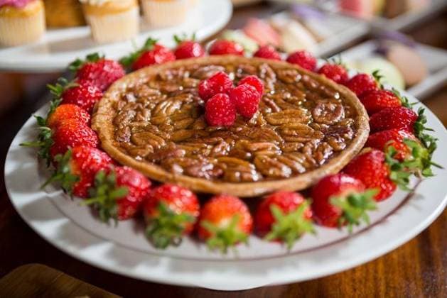 Close-up of strawberry pie at display counter Close-up of strawberry pie at display counter in bakery shop, model released, , property released, Cape Town, South Africa, 04.10.2016, 932478.jpg, coffee shop, shop, market, farmer market, business, small business, bakery section, counter, pastry, cup cake, cake, delicious, dessert, cake stand, indulgence, strawberry pie, pie, strawberry, decorate, tasty, temptation, fruit, topping, raspberry