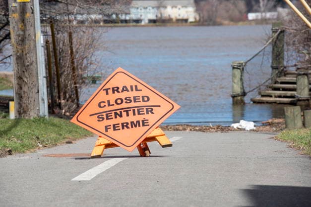 April 20, 2023, Fredericton, New Brunswick, CANADA: New Brunswick officials are warning residents who live near waterways to take precautions before potential flooding. The walking and cycling trails in Downtown Fredericton were closed due to the floodwaters from the St. John River in Fredericton, New Brunswick on Thursday April 20, 2023. Fredericton CANADA  - ZUMAc35_ 20230420_zaf_c35_170 Copyright: xStephenxMacgillivrayx