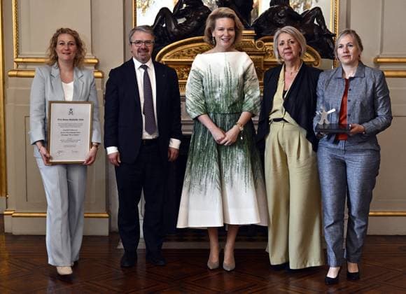 Queen Mathilde of Belgium, Chairman of Fonds Queen Mathilde and Members of ASBL Enfances pose for the photographer at the Queen Mathilde Fund (FRM - KMF) Award ceremony, on Tuesday 21 April 2026, at the Royal Palace in Brussels. Every year, the Queen Mathilde Fund supports inspiring initiatives aimed at helping vulnerable children and young people build their lives and look toward the future.  ERICxLALMAND 171542137
