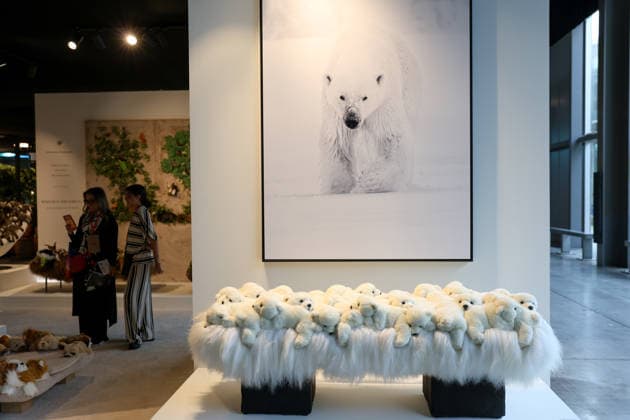 (260421) -- MILAN, April 21, 2026 -- Visitors watch exhibits during the 64th Salone del Mobile at Fiera Milano Rho exhibition center in Milan, Italy, April 21, 2026. ) ITALY-MILAN-SALONE DEL MOBILE-OPENING LixJing 