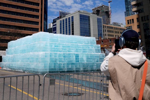 Ice Sculpture Draws Crowd for Drake’s New Album in Toronto TORONTO, CANADA - APRIL 21 : People gather around an ice sculpture, installed in a parking lot as part of a promotional campaign for Canadian rapper Drake’s new album ICEMAN in Toronto, Ontario, Canada on April 21, 2026. Mert Alper Dervis Anadolu Ontario Canada. Editorial use only. Please get in touch for any other usage.  Copyright: x2026xAnadoluxMertxAlperxDervisx