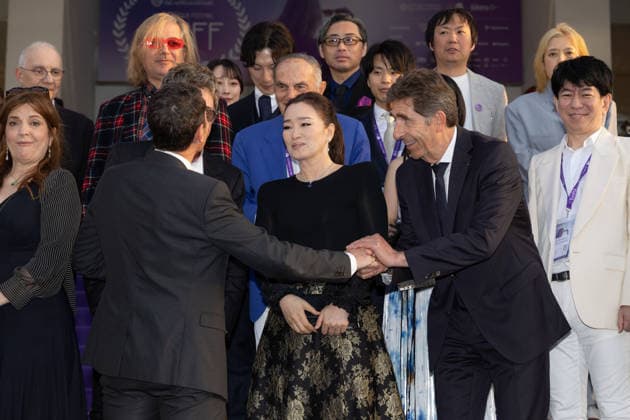 2nd World AI Film Festival Opening ceremony photocall - Cannes David Lisnard, mayor of Cannes, Jean-Michel Jarre, Gong Li, Charles-Ange Ginesy attend the 2nd World AI Film Festival (WAIFF) opening ceremony photocall at the Palais des Festivals in Cannes, France on April 21, 2026. Photo by Shootpix ABACAPRESS.COM Cannes France  Copyright: xShootpix ABACAx