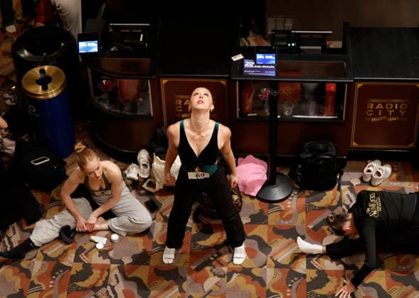 Dancers warm up in the Grand Foyer at Radio City Music Hall before auditioning at the Rockettes open call auditions at Radio City Music Hall in New York City on Wednesday, April 22, 2026. Dancers attending the audition will be considered for a spot on the Rockettes line in the 2026 Christmas Spectacular Starring the Radio City Rockettes and for an invitation to participate in the company s no-fee dancer development.programming this summer which serves as the Rockettes main talent pipeline.  NYP20260422111 JohnxAngelillo