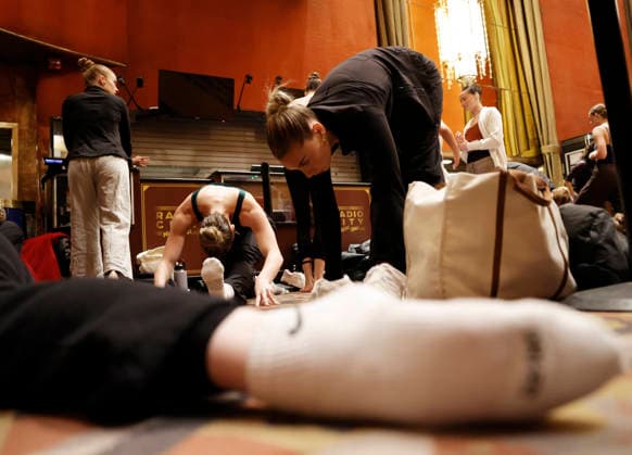 Dancers warm up in the Grand Foyer at Radio City Music Hall before auditioning at the Rockettes open call auditions at Radio City Music Hall in New York City on Wednesday, April 22, 2026. Dancers attending the audition will be considered for a spot on the Rockettes line in the 2026 Christmas Spectacular Starring the Radio City Rockettes and for an invitation to participate in the company s no-fee dancer development.programming this summer which serves as the Rockettes main talent pipeline.  NYP20260422116 JohnxAngelillo