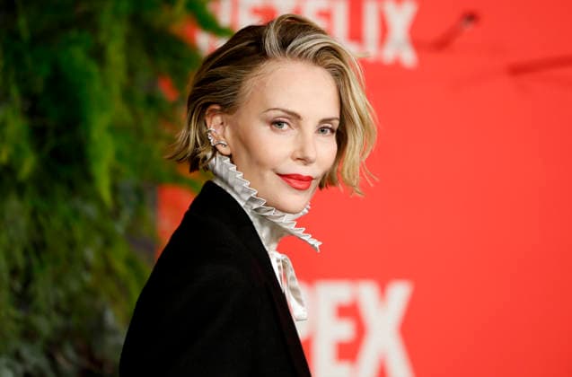 Charlize Theron arrives on the red carpet at Netflix s APEX New York Premiere at The Paris Theater on Wednesday, April 22, 2026 in New York City.  NYP20260422207 JohnxAngelillo