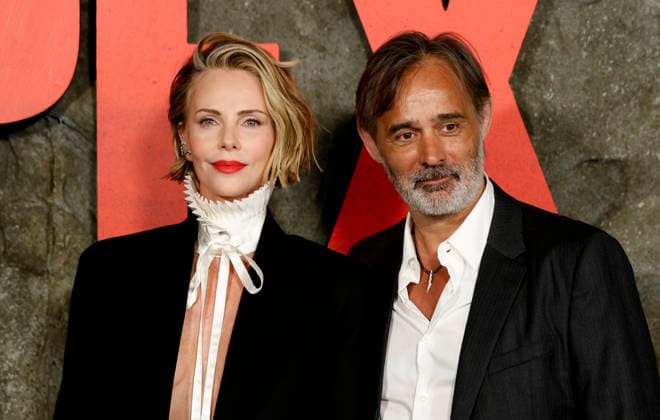 Charlize Theron and Baltasar Kormákur arrive on the red carpet at Netflix s APEX New York Premiere at The Paris Theater on Wednesday, April 22, 2026 in New York City.  NYP20260422212 JohnxAngelillo