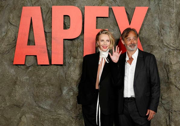 Charlize Theron and Baltasar Kormákur arrive on the red carpet at Netflix s APEX New York Premiere at The Paris Theater on Wednesday, April 22, 2026 in New York City.  NYP20260422213 JohnxAngelillo