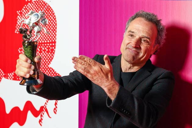 RUSSIA, MOSCOW - APRIL 23, 2026: Spanish film director Daniel Guzman poses with the special jury award for the film The Redemption during the closing ceremony of the 48th Moscow International Film Festival at the Rossiya Theatre. Artyom Geodakyan TASS  91616922