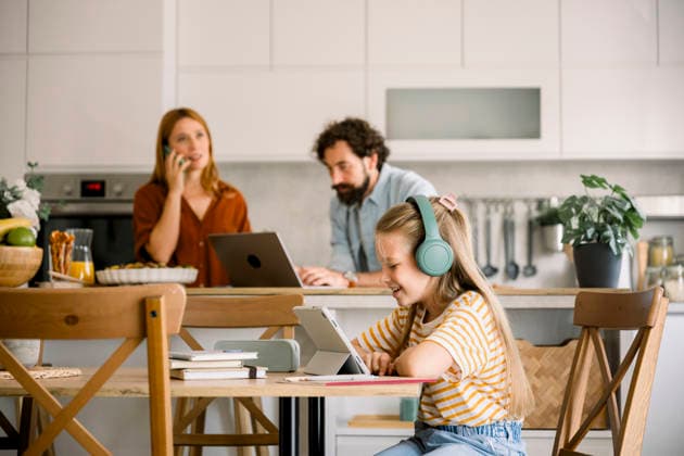 Family working and learning together in kitchen with technology model released, Symbolfoto property released, FLMZF01184