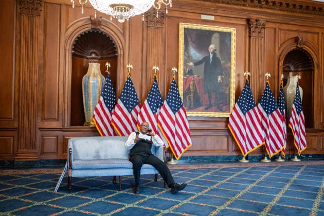 Rayburn Room 4 23 26 UNITED STATES - APRIL 23: A man talks on the phone in the U.S. Capitol™s Rayburn Room on Thursday, April 23, 2026. (Tom Williams CQ Roll Call) Washington DC United States EDITORIAL USE ONLY Copyright: x2026xCQ-RollxCall,xInc.x TomxWilliamsx rollcallpix170495