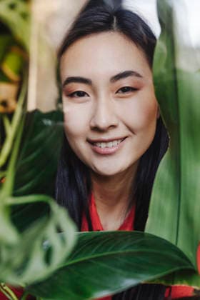 Happy young woman near leaves model released, Symbolfoto property released, YTF02048