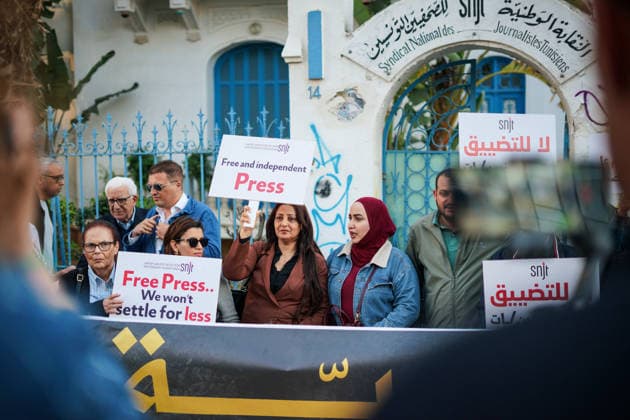 April 24, 2026, Tunis, Tunis, Tunisia: Tunisian activists and journalists hold a protest to demand the release of Tunisian Journalist Mourad Zeghidi in Tunis, Tunisia. Participants held banners and images of Mourad Zeghidi, a radio journalist and political commentator arrested on charges of publishing false news and harming public security under Decree 54 in May 2024 Tunis Tunisia - ZUMAm342 20260424_zsp_m342_001 Copyright: xHasanxMradx