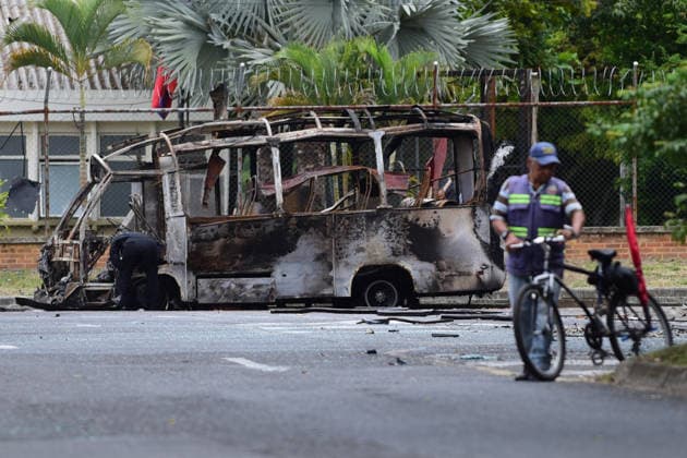 Explosive attack in southern Cali leaves two people injured CALI, COLOMBIA - APRIL 24: A view of destruction after a bus was used in an attack near the Batallon Pichincha in Cali, Colombia, on April 24, 2026. Another act of violence was reported Friday, when a bus loaded with explosive devices detonated in the southern part of the city. The blast occurred near the Batallon Pichincha, in an area connecting to the Hospital Psiquiatrico del Valle and nearby residential neighborhoods, causing concern among residents. Authorities confirmed that two people were injured, received prompt medical care, and are now out of danger. An investigation has been launched to determine the circumstances and identify those responsible. Edwin Rodriguez Pipicano  Copyright: x2026xAnadoluxEdwinxRodriguezxPipicanox