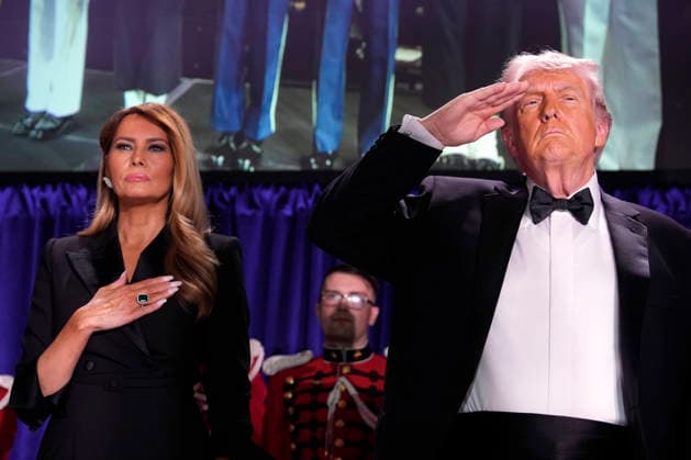April 25, 2026, Washington, District of Columbia, USA: U.S. President DONALD TRUMP, 79, statutes the flag and his wife First Lady MELANIA TRUMP, 56, hand to her heart as national anthem is played, after arriving at the 2026 White House Correspondents Association annual black tie formal dinner in Washington, at Washington Hilton hotel on Saturday where roughly 2,600 guests had assembled. The White House, Washington USA - ZUMAs152 20260425_faa_s152_049 Copyright: xYurixGripas POOLx