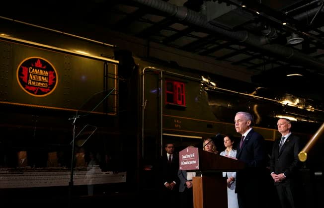 April 27, 2026, Ottawa, On, CANADA: Prime Minister Mark Carney speaks from a lectern beside a Canadian National Railways locomotive at the Canada Science and Technology Museum, during an announcement on the Canada Strong Fund, Canada s first sovereign wealth fund in Ottawa on Monday, April 27, 2026. Ottawa CANADA  - ZUMAc35_ 20260427_zaf_c35_010 Copyright: xJustinxTangx
