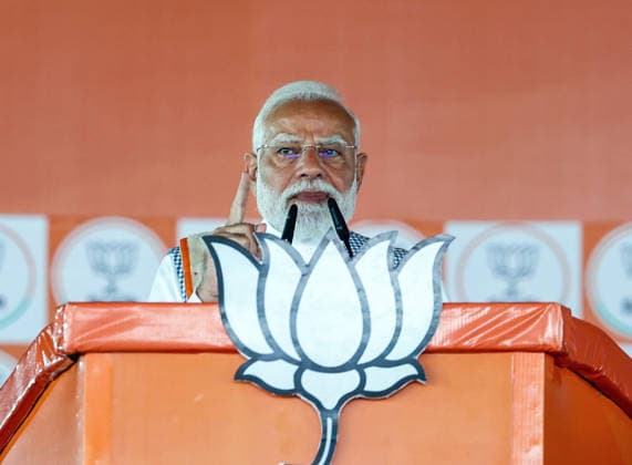 RECORD DATE NOT STATED PM Modi at a public meeting at Barrackpore in North 24 Parganas North 24 Parganas West Bengal , Apr 27 (ANI): Prime Minister Narendra Modi addresses the public meeting ahead of the second phase of West Bengal Assembly elections at Barrackpore, in North 24 Parganas on Monday. (Narendra Modi Photo Gallery ANI Photo) North 24 Parganas West Bengal India Copyright: xANIx ANI_20260427116