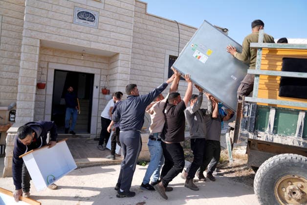 Palestinians evacuate home after Israeli Settler attack in West Bank WEST BANK, PALESTINE - APRIL 27: Palestinians evacuate usable items from a home following an attack by Israeli settlers in the village of Jalud, south of Nablus, in West Bank, Palestine on April 27, 2026. According to local sources, dozens of settlers, under the protection of Israeli soldiers, stormed the village and attacked residents and their property with stones and Molotov cocktails, setting fires to homes and vehicles. Issam Rimawi Anadolu Nablus West Bank. Editorial use only. Please get in touch for any other usage.  Copyright: x2026xAnadoluxIssamxRimawix