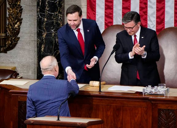 Britain s King Charles III shakes hands with Vice President JD Vance and Speaker of the House Mike Johnson as he prepares to deliver an address to a joint meeting of Congress at the U.S. Capitol in Washington DC on Tuesday, April 28, 2026. The king and Queen Camilla are on a four-day state visit to the U.S. with stops in Washington and New York.  WAP20260428963 BONNIExCASH