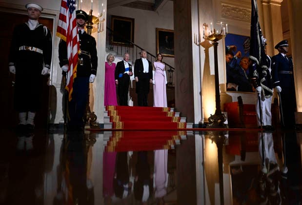 President Donald Trump and first lady Melania Trump pose for a photo with Britain s King Charles III and Queen Camilla before a state dinner at the White House on Tuesday, April 28, 2026 in Washington, DC. Charles spoke to a joint session of Congress earlier in the day, and attended several events with U.S. President Donald Trump.  WAX20260428214 CraigxHudson