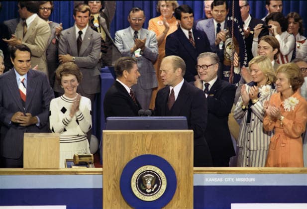 August 19, 1976, Kansas City, Missouri, USA: U.S. President Gerald R. Ford, as Republican presidential nominee, shaking hands with nomination foe Ronald Reagan on closing night of Republican National Convention, Kemper Arena, Kansas City, Missouri, USA, Gerald R. Ford White House Photographs, August 19, 1976 Kansas City USA - ZUMAg145 19760819_zap_g145_002 Copyright: xJTxVintagex