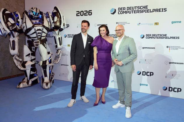 Felix Falk, Dorothee Bär und Fabian Mehring bei der Verleihung des Deutschen Computerspielpreises 2026 im Herkulessaal der Residenz. München, 29.04.2026