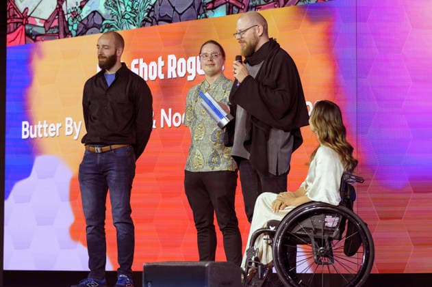 Kristina Vogel mit den Preisträgern von Flick Shot Rogues bei der Verleihung des Deutschen Computerspielpreises 2026 im Herkulessaal der Residenz. München, 29.04.2026