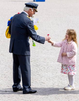 30-04-2026 Outer King Carl XVI Gustaf receives flowers from children during the Swedish Armed Forces tribute on the Outer Courtyard of the Royal palace as part of the celebrations of King Carl Gustafs 80th birthday in Stockholm, Sweden. Â  Copyright: xPPEx