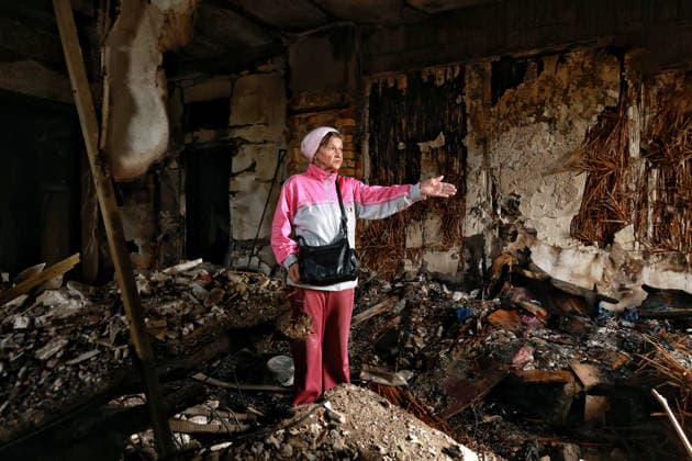 A woman stands among the rubble in an apartment block damaged by a Russian drone strike, Odesa, Ukraine, April 30, 2026. Russian forces launched a massive drone attack on the city, damaging a kindergarten, two schools, residential buildings, a parking lot, nearby garages, and a hotel. Twenty people were injured, including a 17-year-old boy. (Photo by Nina Liashonok Ukrinform) Large-scale Russian drone attack on Odesa  Copyright: xNinaxLiashonokx