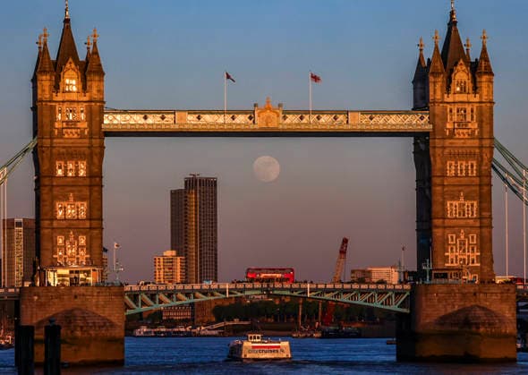 April 30, 2026, London, London, UK: London, UK. A waxing gibbous Moon rises behind Tower Bridge in central London. TomorrowÃ¢â‚¬â ¢s full Moon, known as the Flower Moon, coincides with the season when flowers bloom across the Northern Hemisphere. London UK  - ZUMAl94_ 20260430_zaf_l94_063 Copyright: xMarcinxNowakx