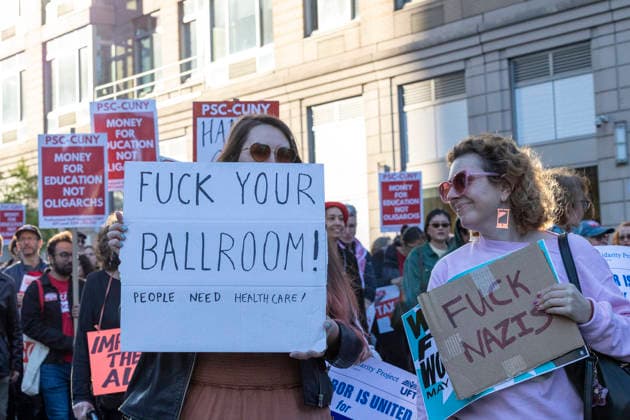 May 1, 2026, New York, New York, USA: Unions, immigrant organizations and community advocates marched to Foley Square in Manhattan s Civic Center after a rally in Washington Square Park commemorating May Day, or International WorkersÃ¢â‚¬â ¢ Day. People hold signs that read FUCK YOUR BALLROOM PEOPLE NEED HEALTHCARE FUCK NAZIS. Demonstrators denounce the Trump administration for assaults on working people and the Labor Movement calling for unity, collective action, and protections for all workers. New York USA - ZUMAr174 20260501_znp_r174_092 Copyright: xGinaxMxRandazzox